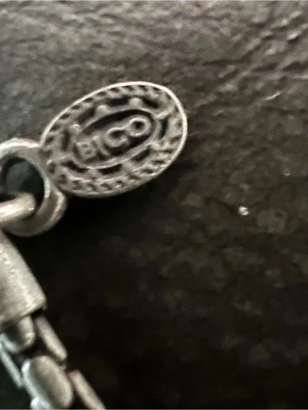 Silver tone Turtle Pendant Necklace with Red and Pink Accent Stones.